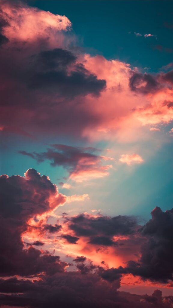 wallpaper para celular de azul com nuvens cor de rosa