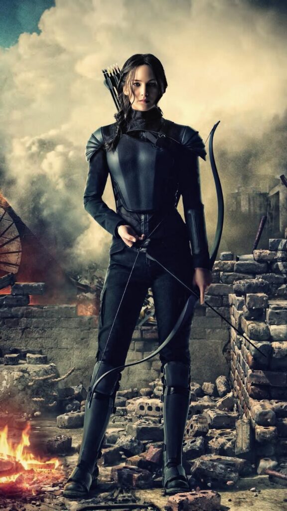 Katniss é capturada em um momento épico de desafio e superação, proporcionando um cenário inspirador nesse wallpaper para celular